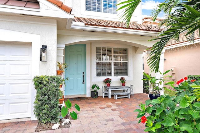 property entrance with a garage