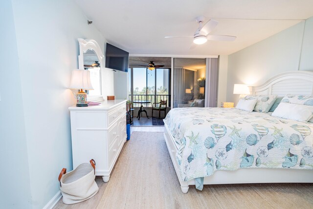 bedroom with ceiling fan and light hardwood / wood-style floors