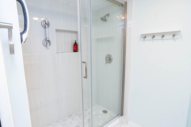 bathroom featuring walk in shower