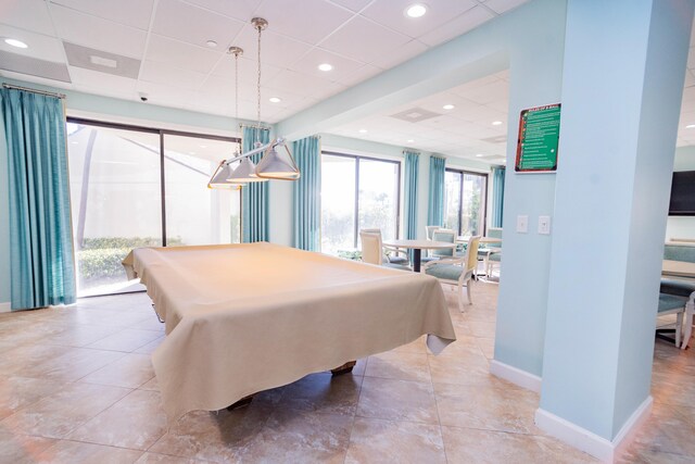 playroom featuring a drop ceiling, light tile patterned flooring, and billiards