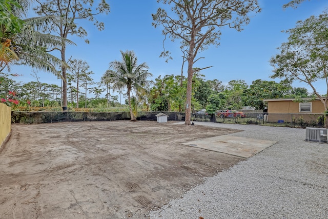 view of yard with central AC unit