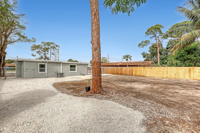 view of yard with central AC