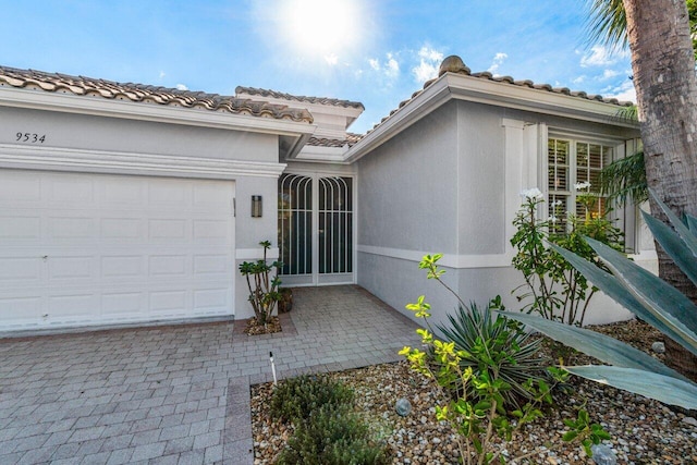 view of front of property with a garage