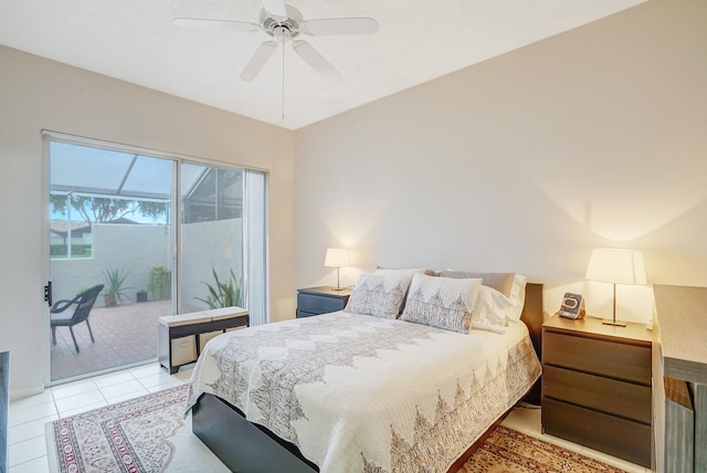 bedroom with light tile patterned floors, access to exterior, and ceiling fan