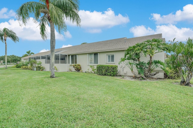 view of front of house with a front lawn