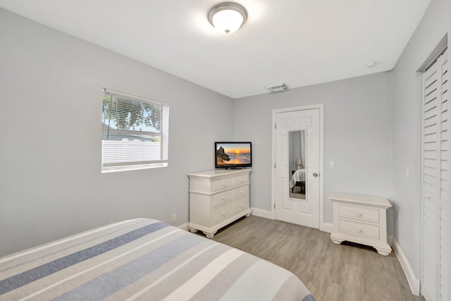 bedroom with light hardwood / wood-style flooring