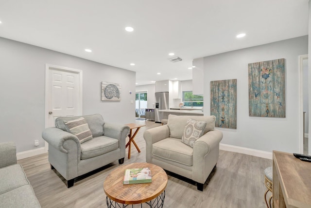 living room featuring light hardwood / wood-style floors