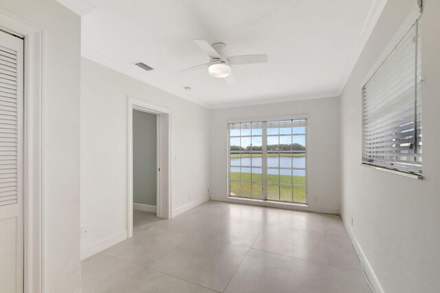330 Cedar Key Cir, Atlantis, FL 33462 - unfurnished bedroom featuring crown molding, a water view, baseboards, and visible vents
