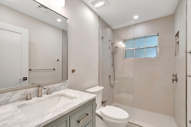 330 Cedar Key Cir, Atlantis, FL 33462 - bathroom featuring vanity, walk in shower, toilet, and visible vents