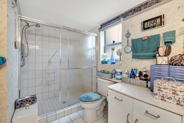 9668 Sills Dr Unit 101, Boynton Beach, FL 33437 - full bath with a stall shower, tile patterned floors, toilet, wallpapered walls, and vanity