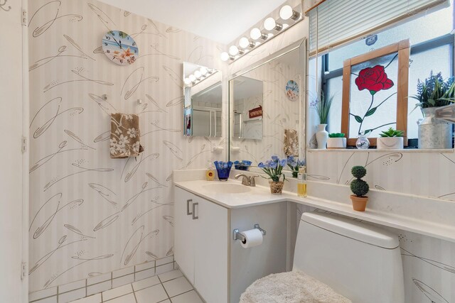 9668 Sills Dr Unit 101, Boynton Beach, FL 33437 - full bath featuring toilet, vanity, a shower with shower curtain, and tile patterned floors