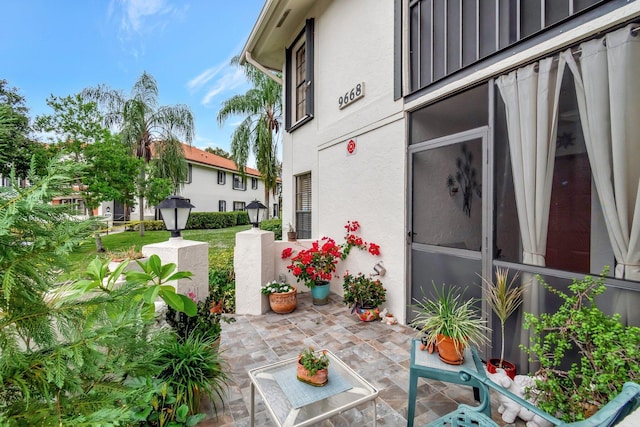 9668 Sills Dr Unit 101, Boynton Beach, FL 33437 - balcony with a patio area