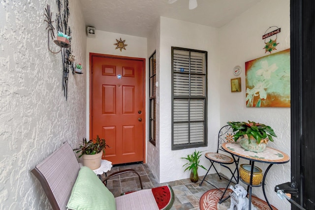 9668 Sills Dr Unit 101, Boynton Beach, FL 33437 - property entrance featuring stucco siding and covered porch