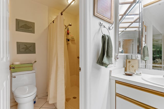 bathroom with a shower with shower curtain, vanity, toilet, and tile patterned floors