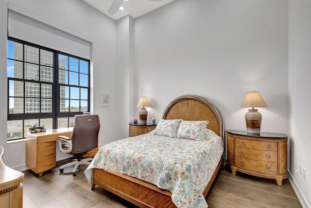 bedroom featuring ceiling fan and wood-type flooring