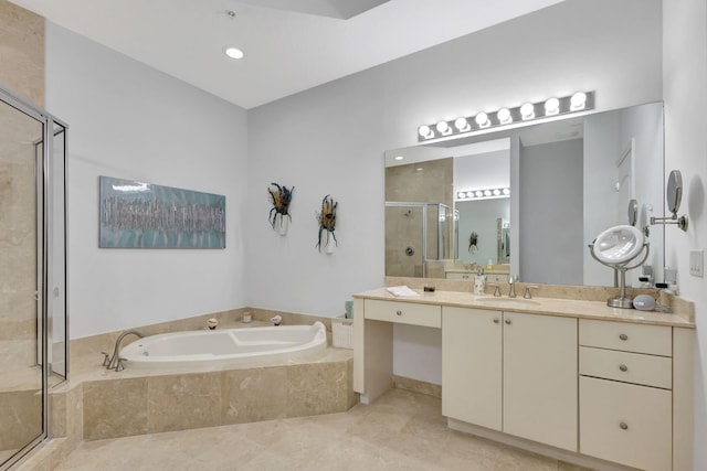 bathroom with tile patterned flooring, vanity, and independent shower and bath