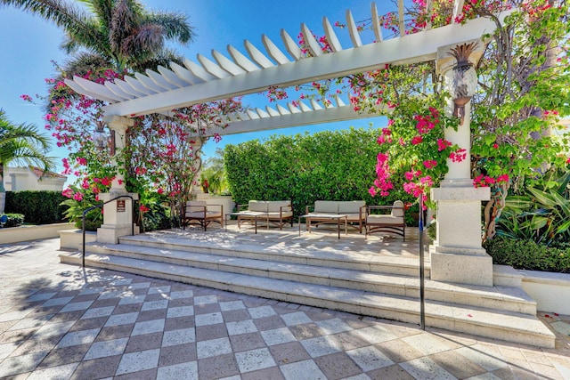 view of patio with a pergola and an outdoor hangout area