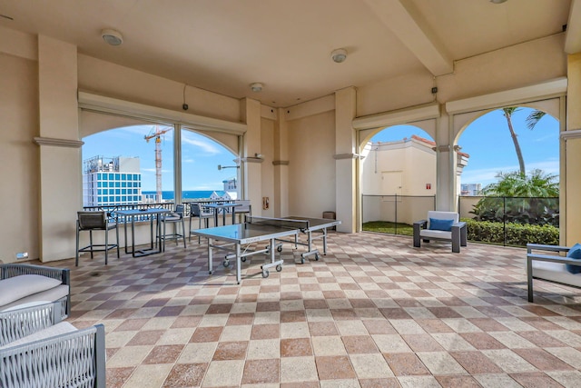 view of patio featuring a water view