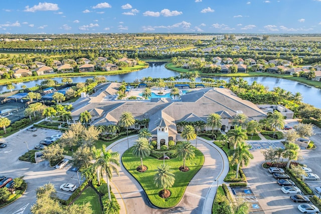 birds eye view of property featuring a residential view and a water view