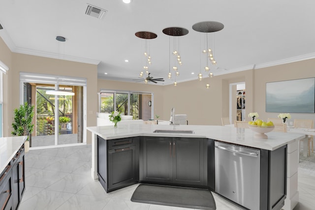 kitchen featuring visible vents, dishwasher, hanging light fixtures, a kitchen island with sink, and a sink