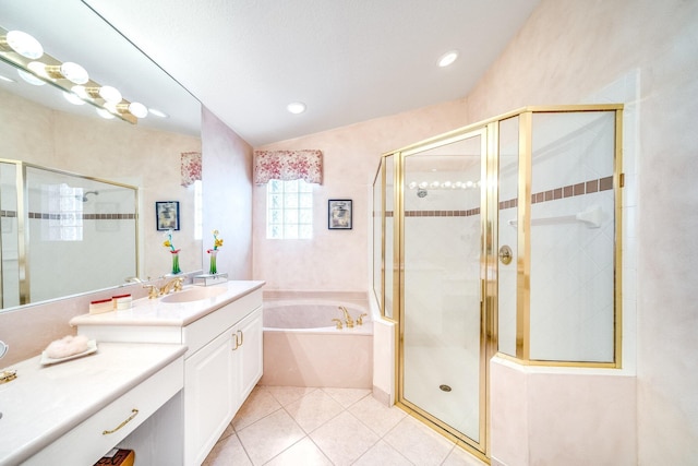 bathroom featuring tile patterned flooring, vanity, separate shower and tub, and vaulted ceiling