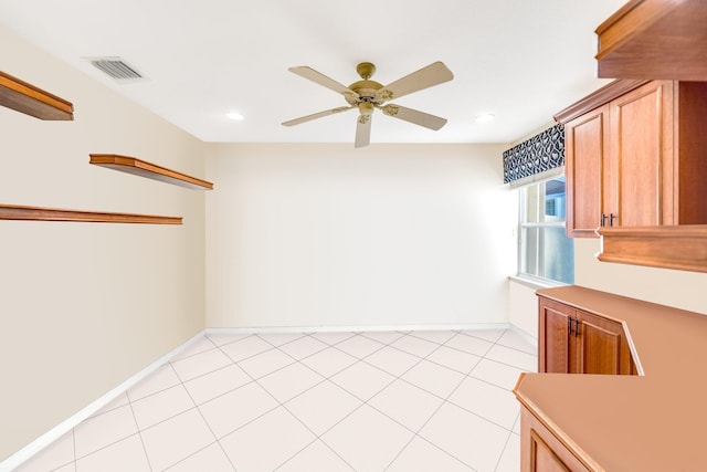 empty room featuring ceiling fan