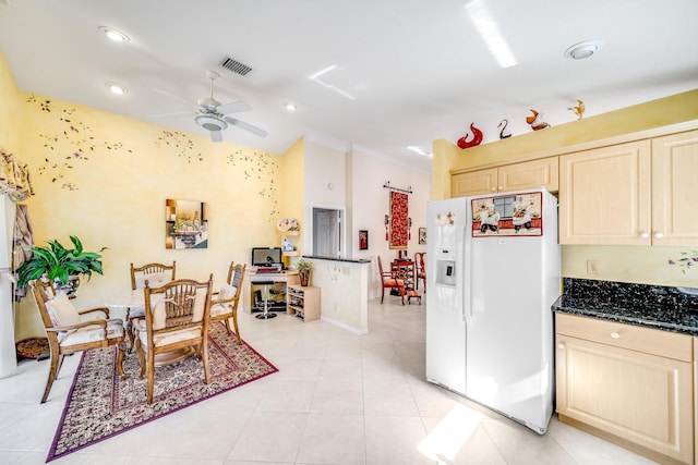 kitchen featuring ornamental molding, ceiling fan, white refrigerator with ice dispenser, light brown cabinets, and light tile patterned floors