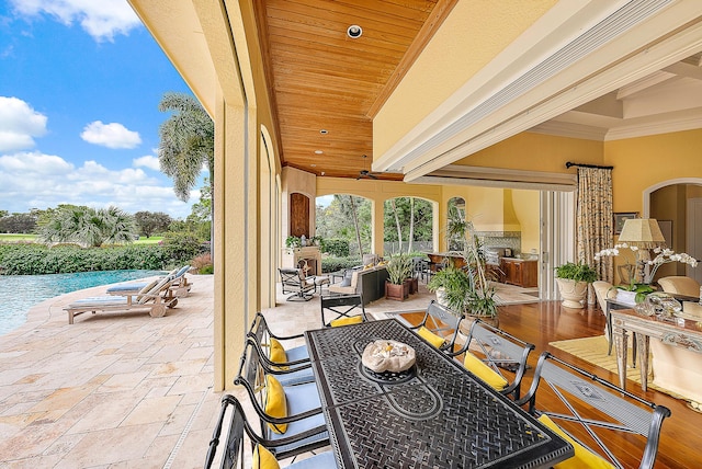 sunroom / solarium with wood ceiling