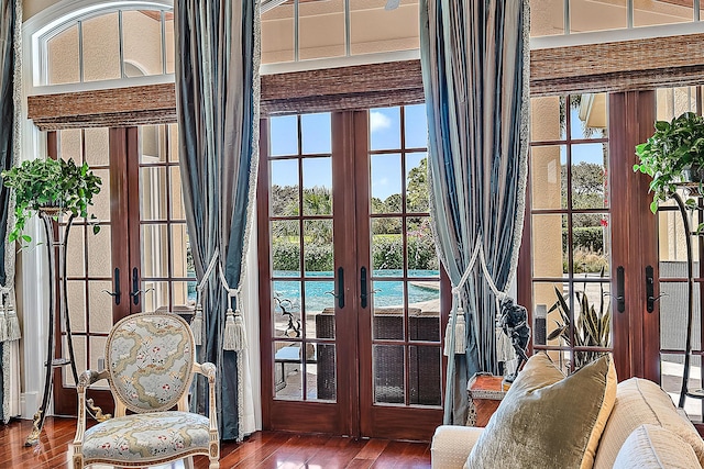 entryway with french doors and hardwood / wood-style floors