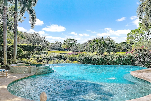 view of pool featuring pool water feature