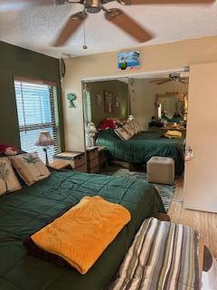 bedroom featuring wood-type flooring