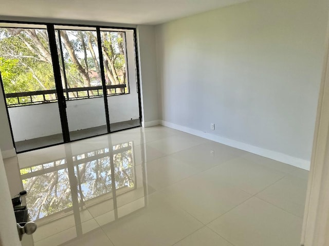 empty room with tile patterned floors