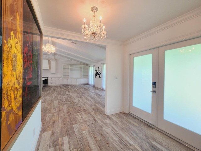 unfurnished living room with french doors, light wood-type flooring, vaulted ceiling, crown molding, and a chandelier