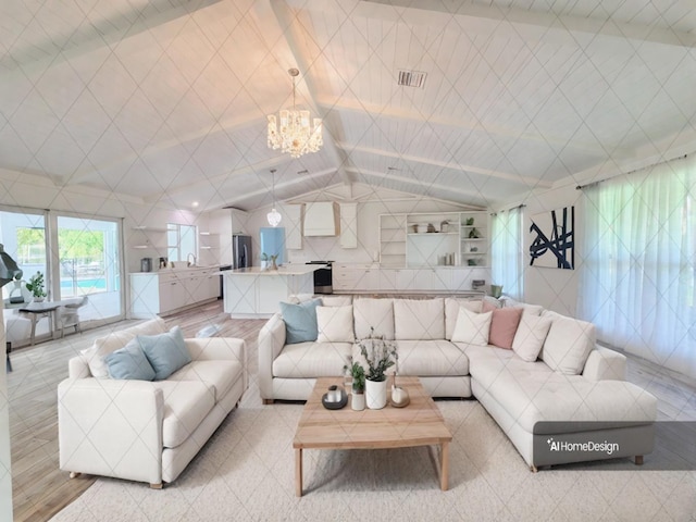 living room featuring a notable chandelier