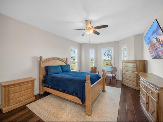 bedroom featuring hardwood / wood-style floors and ceiling fan