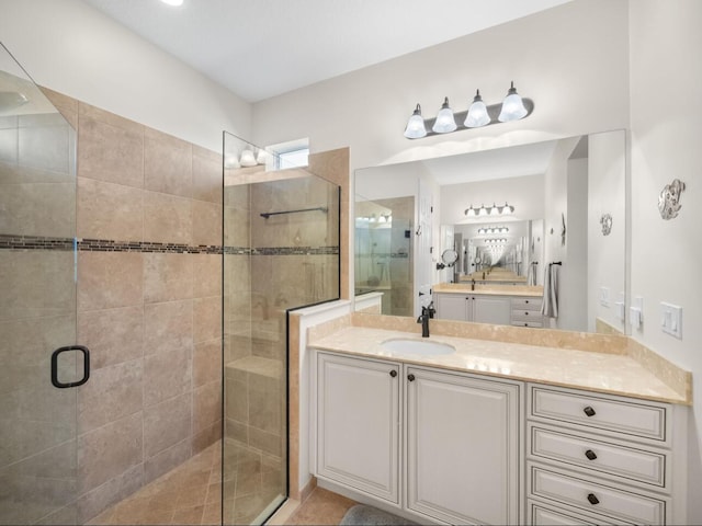 10313 SW Fernwood Ave, Port Saint Lucie, FL 34987 - full bathroom with a shower stall and two vanities