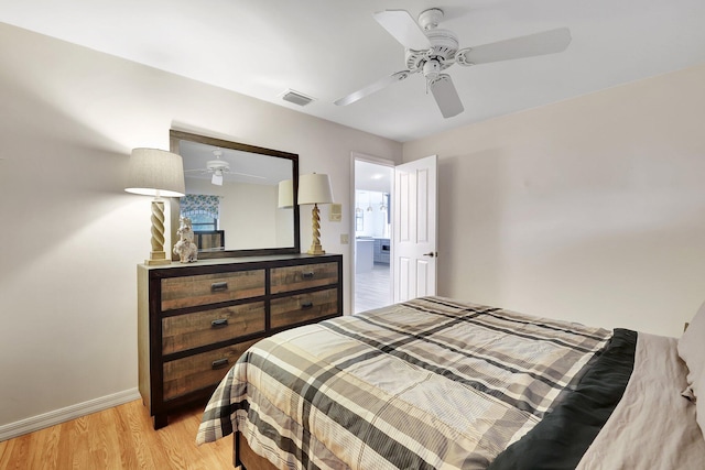 bedroom featuring light hardwood / wood-style floors and ceiling fan