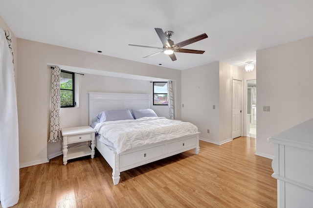 bedroom featuring light wood-type flooring and ceiling fan