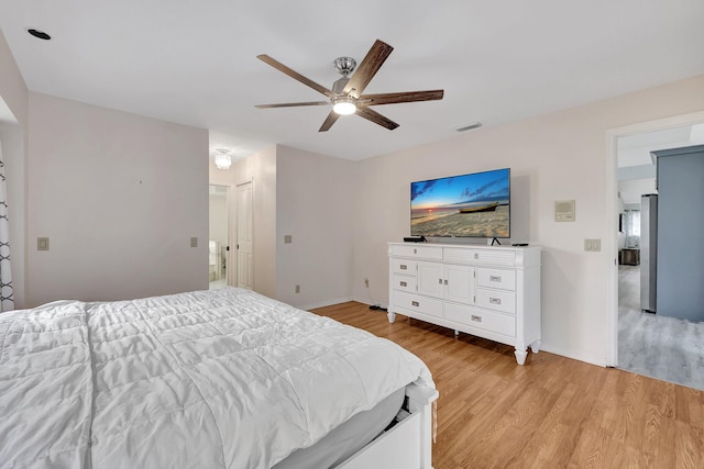 bedroom featuring ceiling fan and light hardwood / wood-style floors