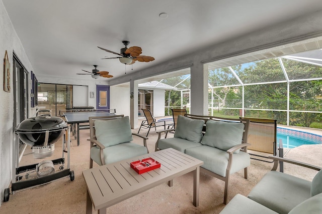 sunroom / solarium with ceiling fan