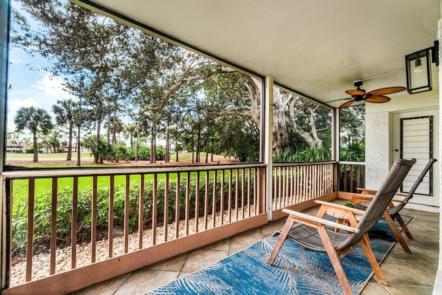 sunroom / solarium with ceiling fan