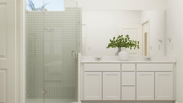 bathroom featuring vanity and an enclosed shower