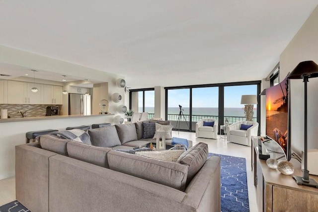 living room with floor to ceiling windows