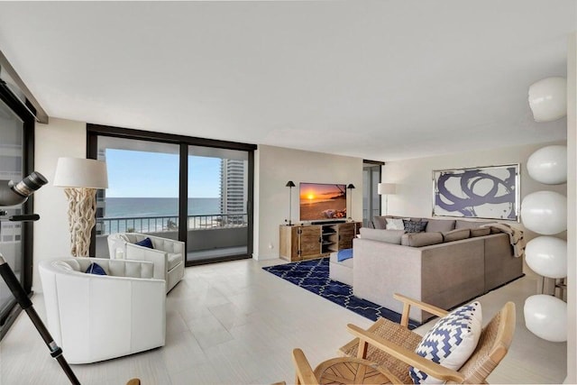 living room with floor to ceiling windows