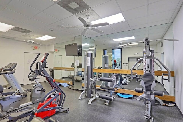 exercise room with a drop ceiling