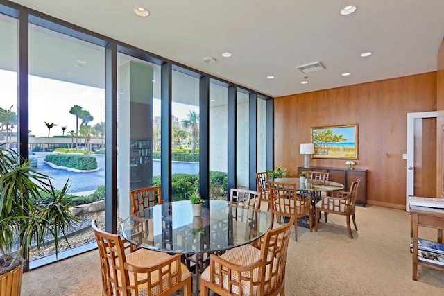 dining space with light carpet