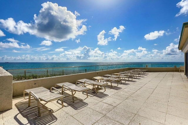 view of patio / terrace with a water view