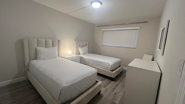 bedroom featuring hardwood / wood-style floors