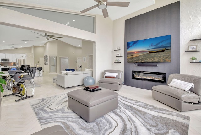 living room featuring high vaulted ceiling