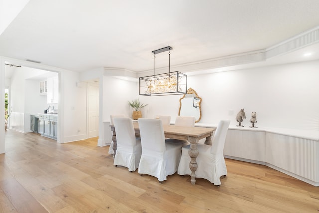 dining space with light wood-type flooring